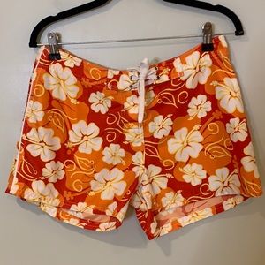 Crazy Shirt Hawaii ‘64 - Women’s Surf Shorts - Bright Orange Floral Retro